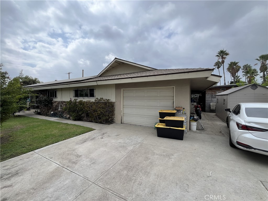 a car parked in front of a house