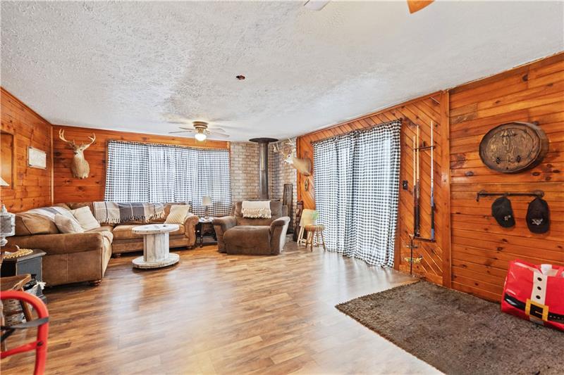 5158 McCandless Road Butler, PA 16001 - Photo 11 of 41 a living room with furniture window and wooden floor