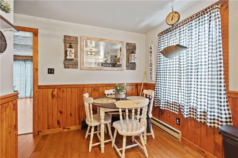 5158 McCandless Road Butler, PA 16001 - Photo 15 of 41 a view of a dining room with furniture and wooden floor