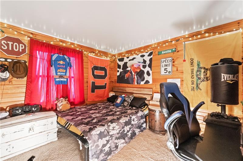 5158 McCandless Road Butler, PA 16001 - Photo 24 of 41 a bedroom with a bed and wooden floor