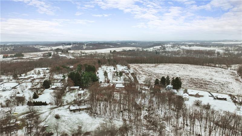 5158 McCandless Road Butler, PA 16001 - Photo 37 of 41 an aerial view of ocean and residential houses with outdoor space