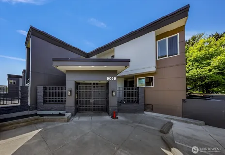 a view of a house with a garage