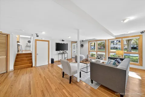 a view of a backyard with plants and a garden