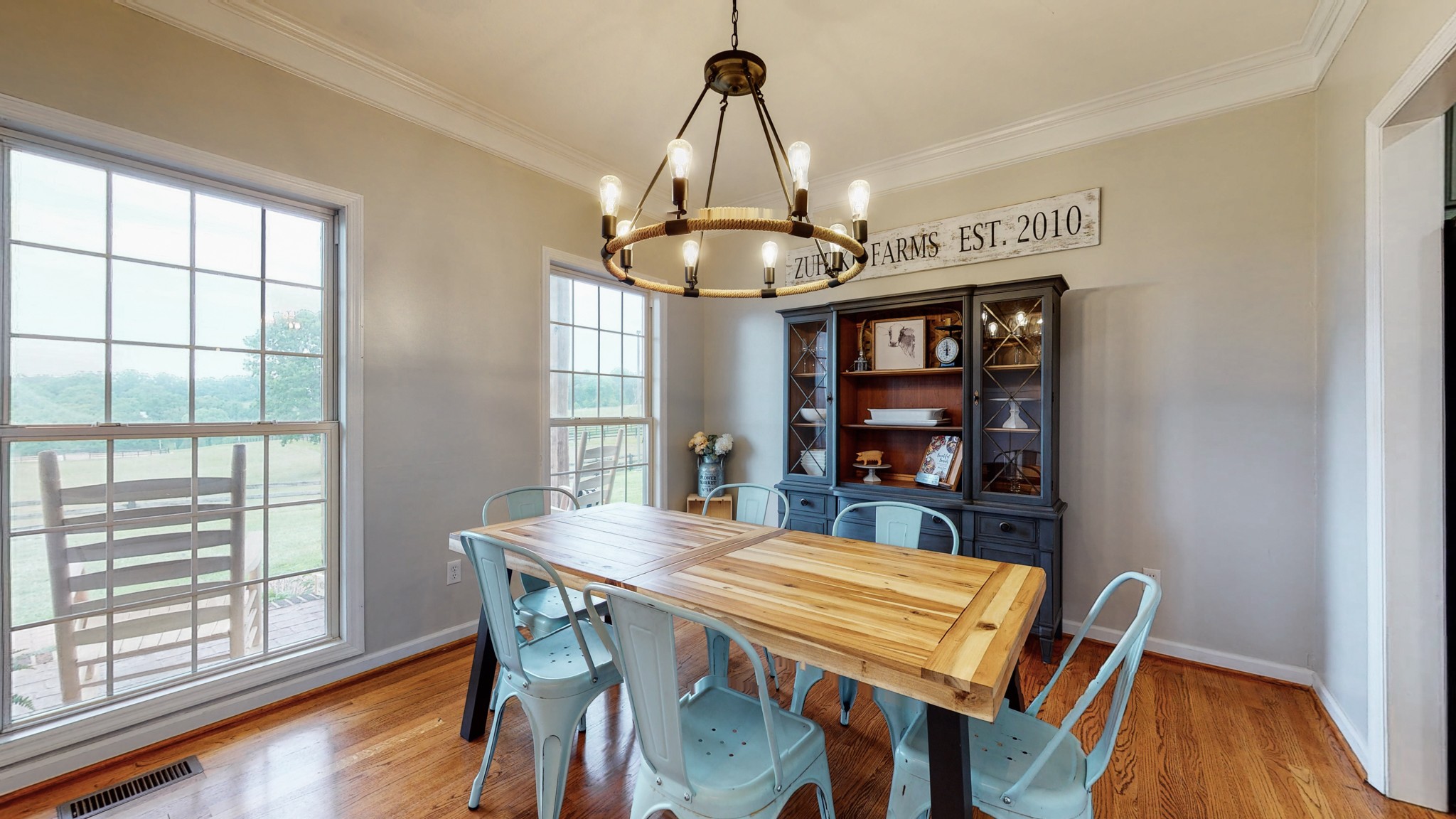 885 Southerland Road Dickson, TN 37055 - Photo 12 of 40 a view of a dining room with furniture window and wooden floor