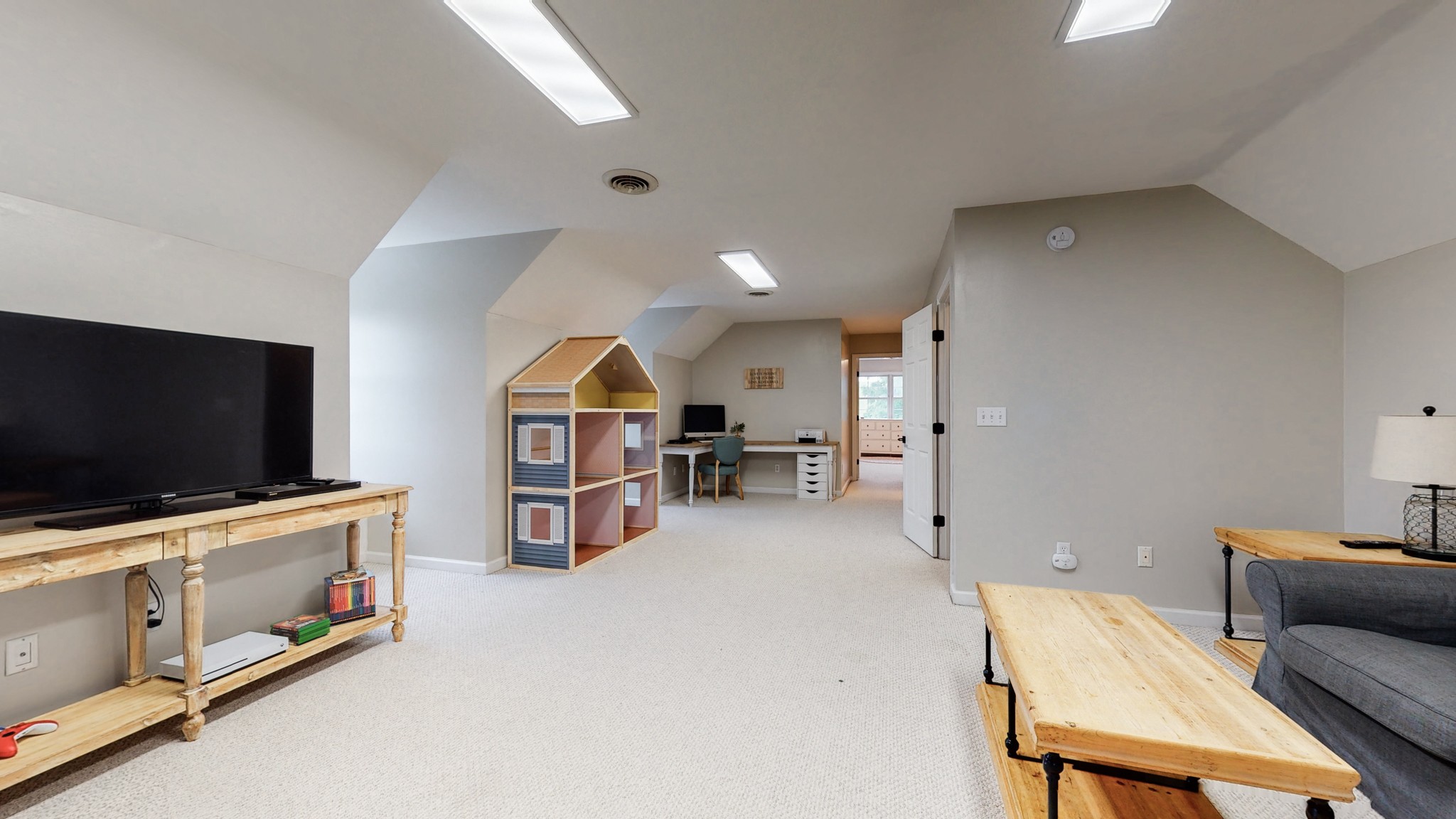885 Southerland Road Dickson, TN 37055 - Photo 20 of 40 a living room with furniture and a flat screen tv