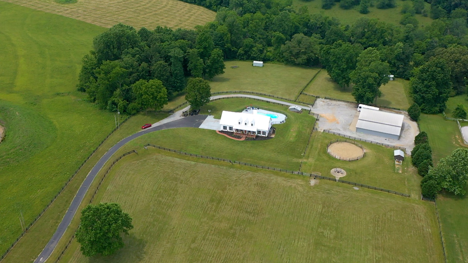 885 Southerland Road Dickson, TN 37055 - Photo 25 of 40 an aerial view of a house with swimming pool a yard and mountain view