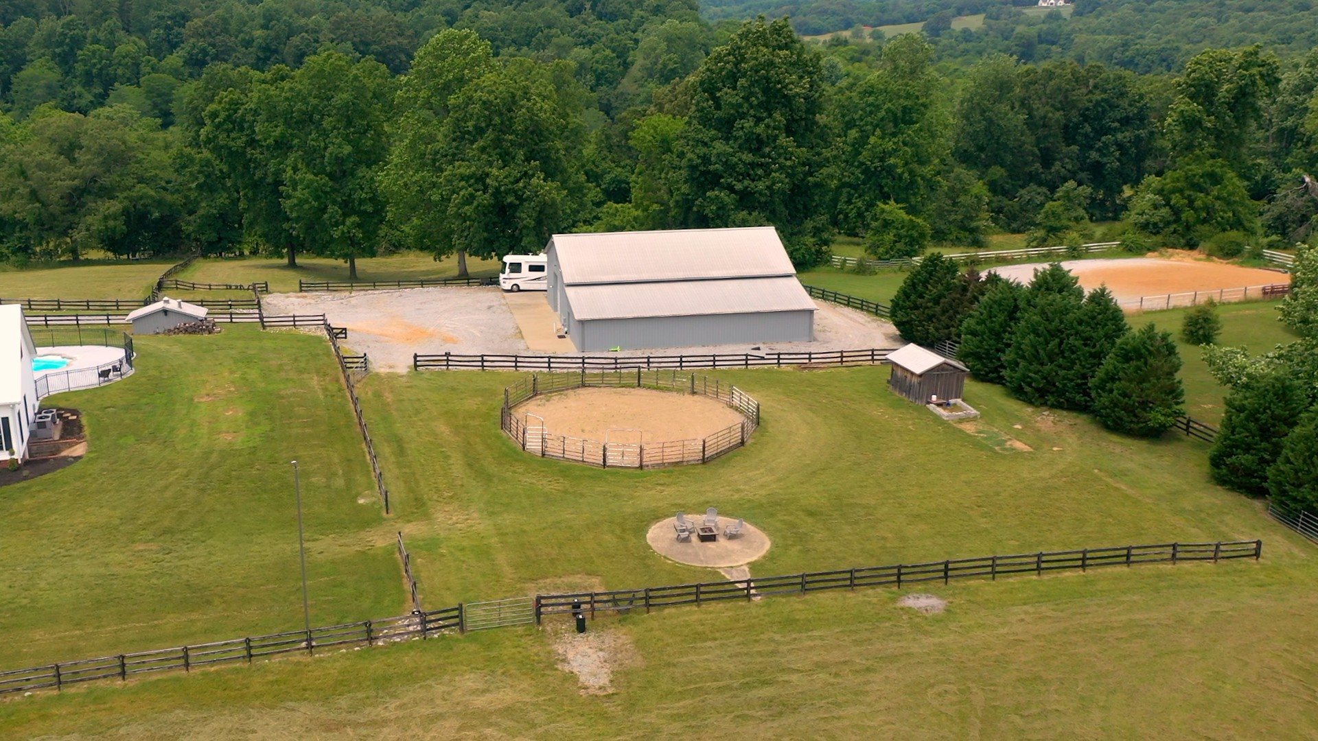885 Southerland Road Dickson, TN 37055 - Photo 31 of 40 an aerial view of a house with swimming pool and large trees
