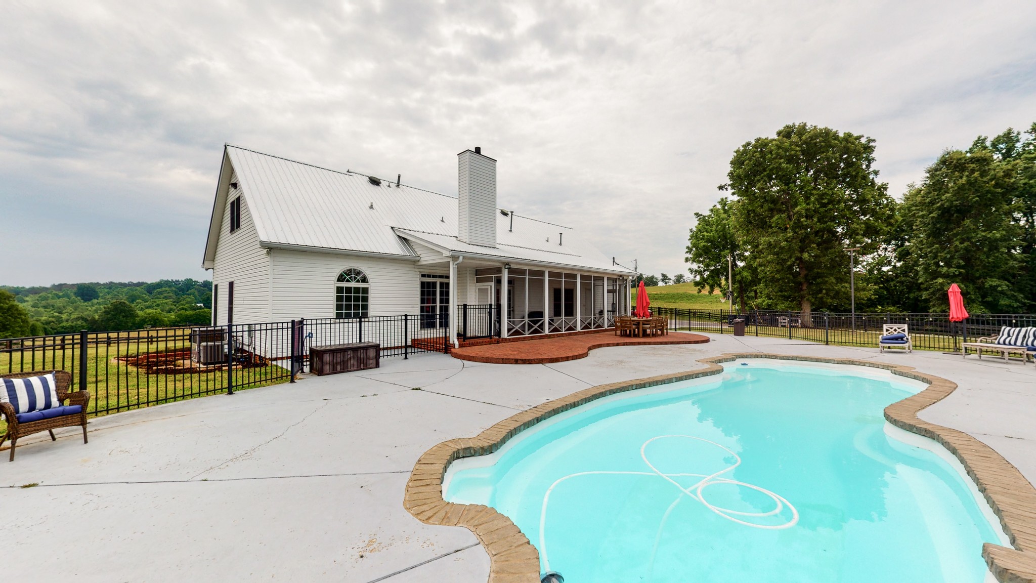 885 Southerland Road Dickson, TN 37055 - Photo 6 of 40 a view of a house with swimming pool and sitting area