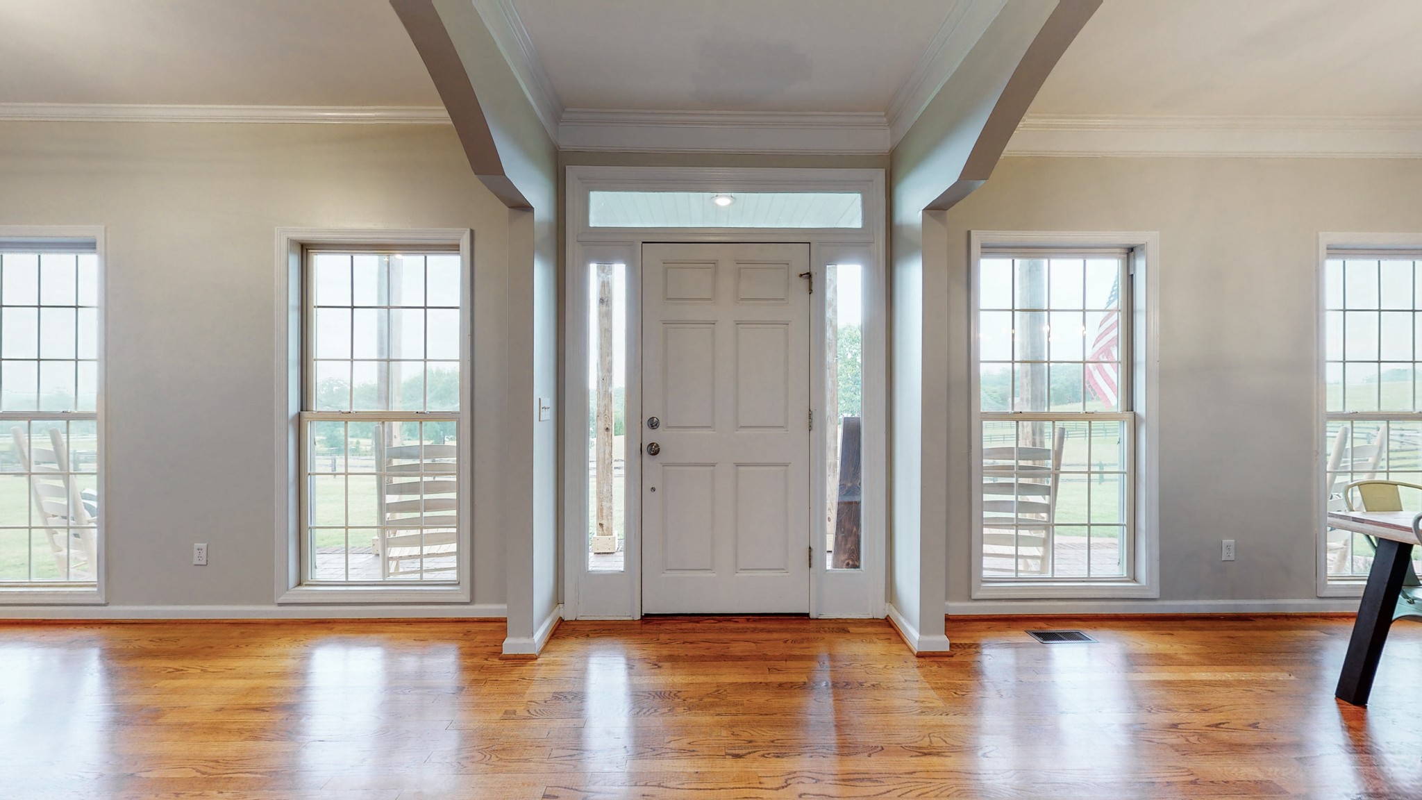 885 Southerland Road Dickson, TN 37055 - Photo 10 of 40 a view of an empty room with wooden floor and a window