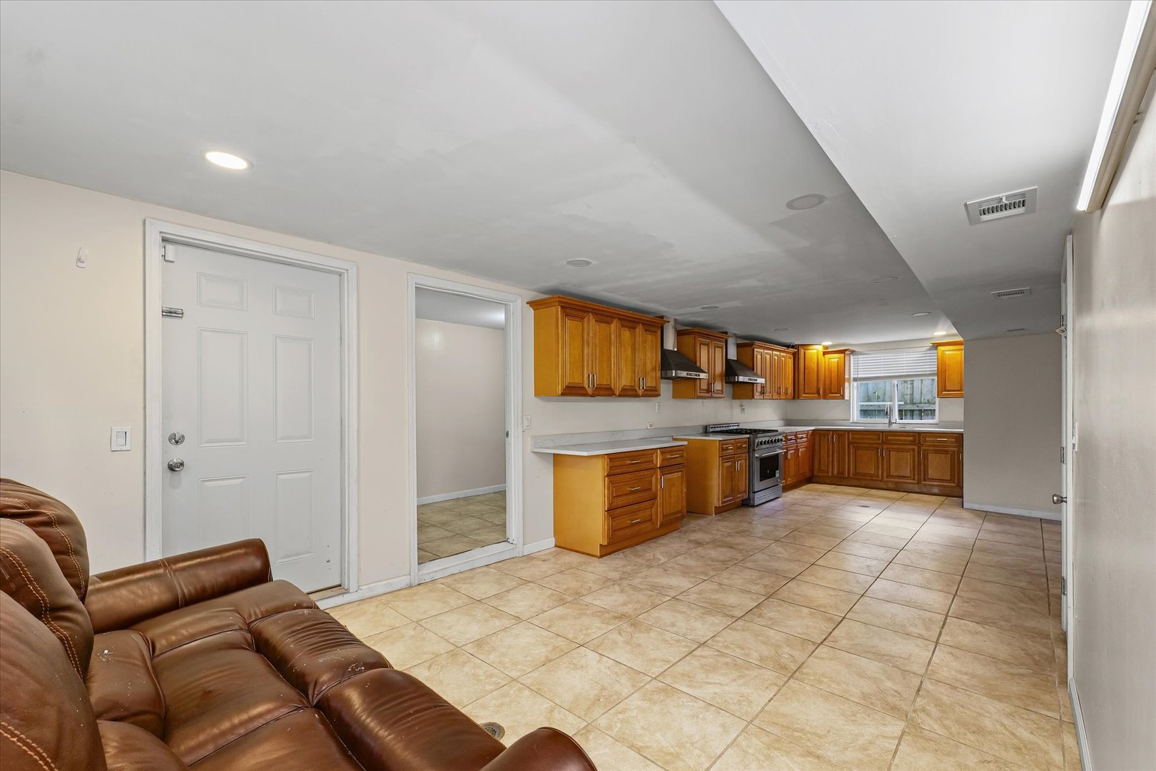 1507 North Ridgeway Avenue Champaign, IL 61821 - Photo 13 of 47 a bedroom with furniture and a large window