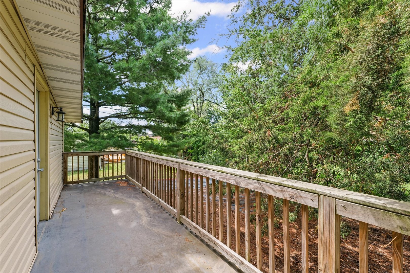 1507 North Ridgeway Avenue Champaign, IL 61821 - Photo 28 of 47 a view of a balcony with floor to ceiling window