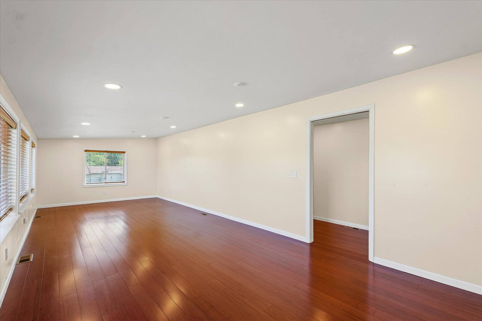 1507 North Ridgeway Avenue Champaign, IL 61821 - Photo 35 of 47 a view of an empty room with wooden floor and a window