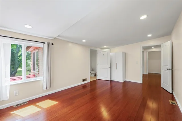 a bathroom with a sink a mirror and a shower