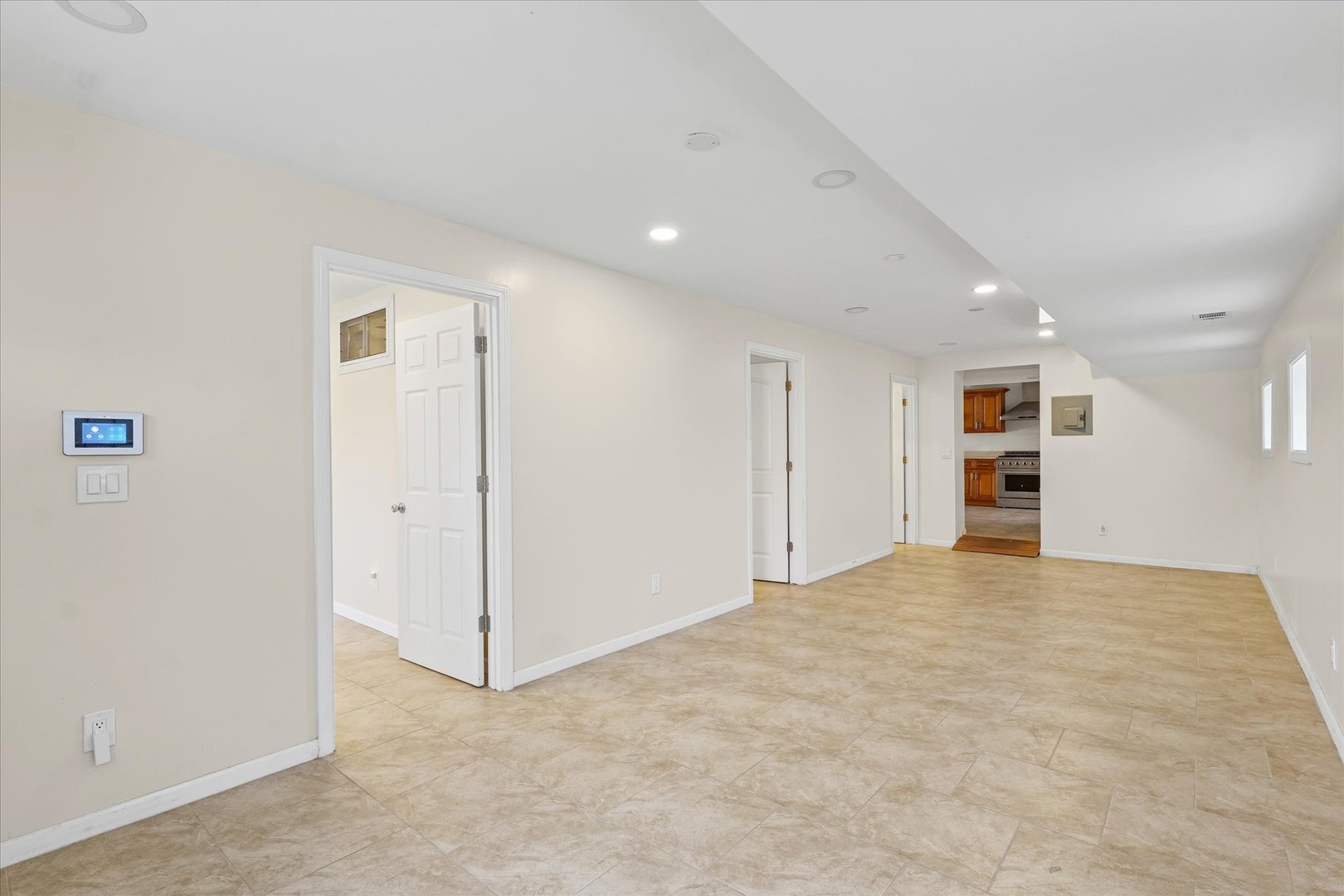 1507 North Ridgeway Avenue Champaign, IL 61821 - Photo 7 of 47 a view of an empty room with a kitchen