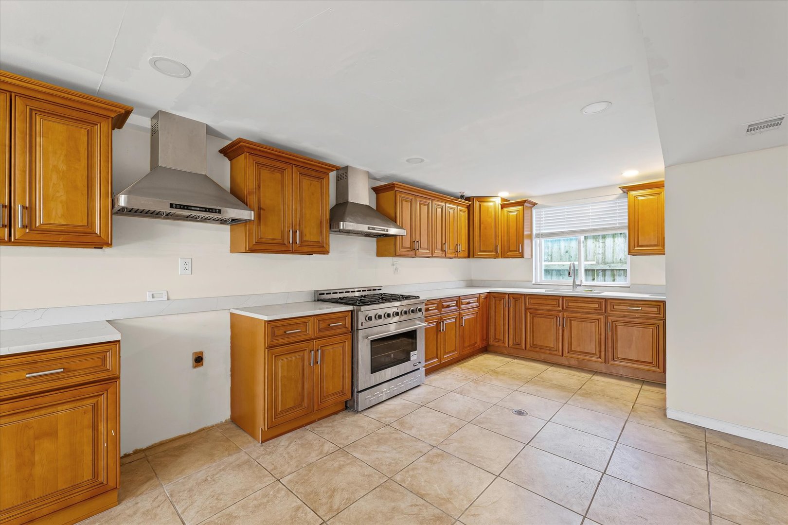 1507 North Ridgeway Avenue Champaign, IL 61821 - Photo 9 of 47 a kitchen with stainless steel appliances granite countertop a stove a sink and a microwave