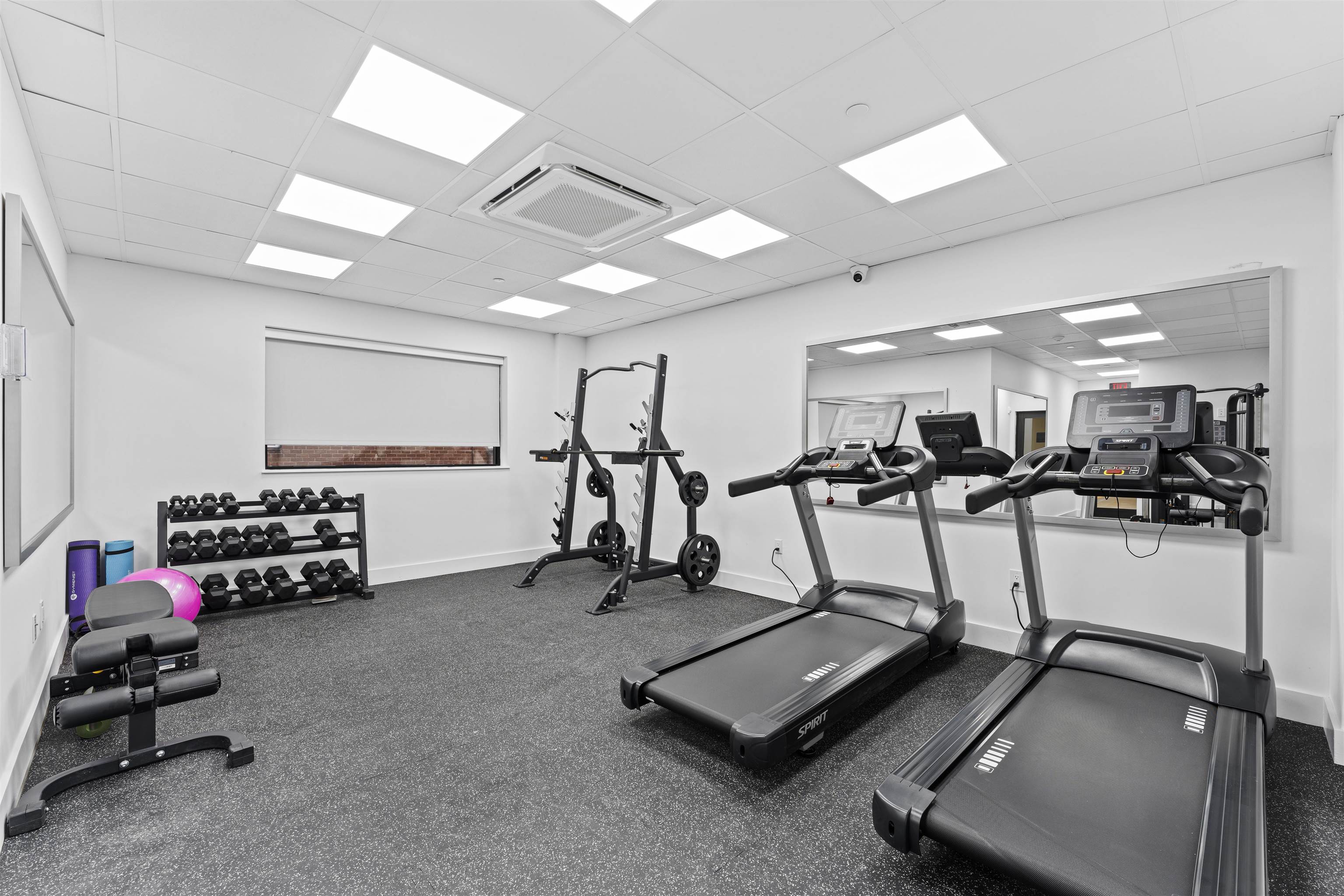 60-64 68th Street, Unit 505 Guttenberg, NJ 07093 - Photo 20 of 24 a view of a room with gym equipment