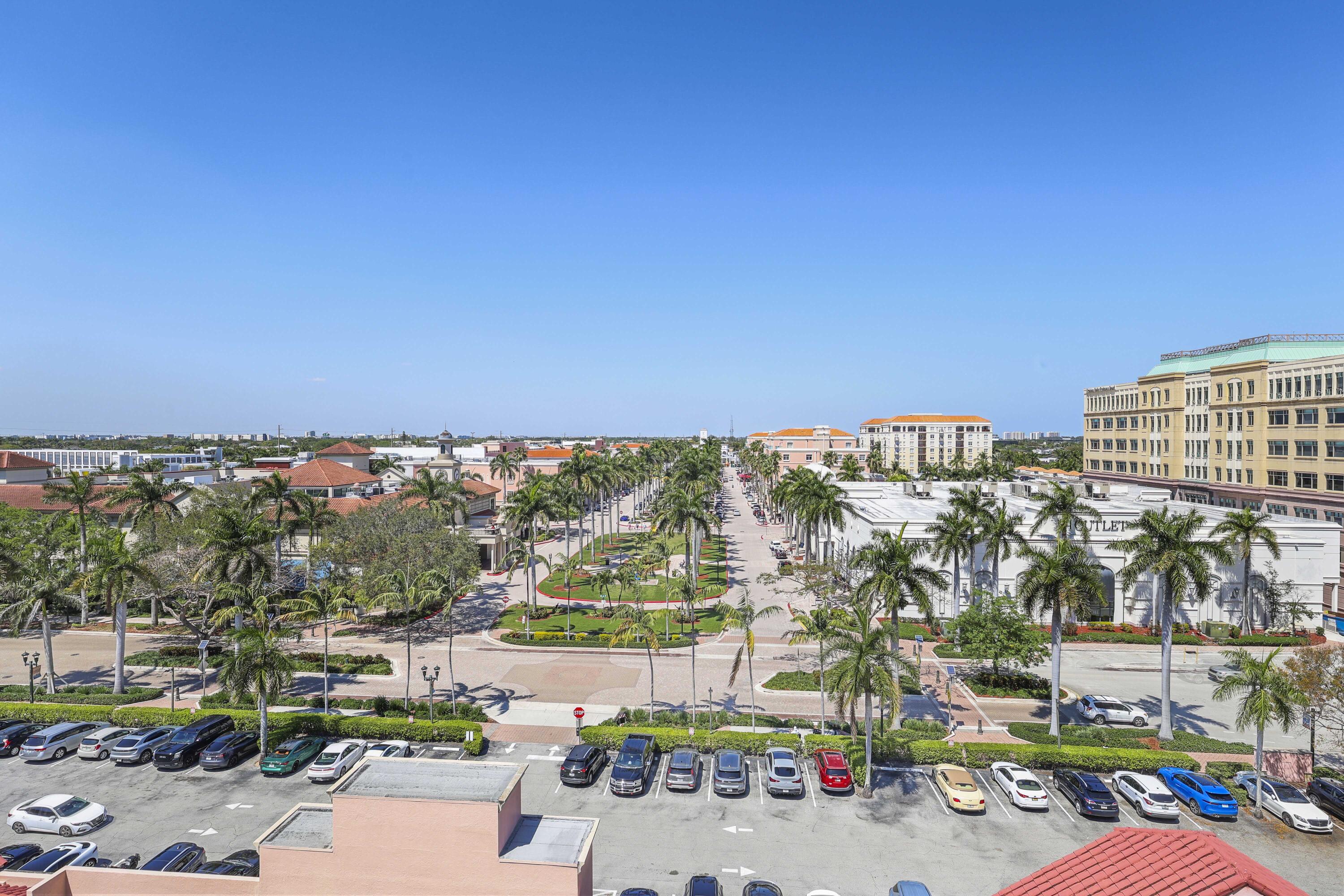 155 East Boca Raton Road, Unit 723 Boca Raton, FL 33432 - Photo 17 of 54 a view of swimming pool with outdoor seating and a garden