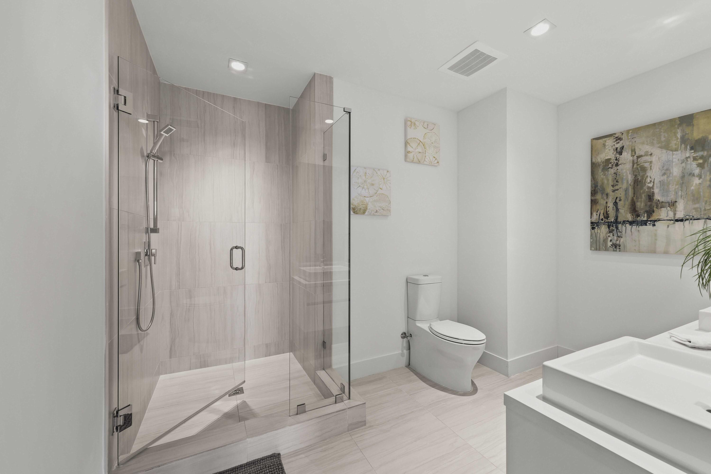 155 East Boca Raton Road, Unit 723 Boca Raton, FL 33432 - Photo 25 of 54 a bathroom with a shower and a toilet