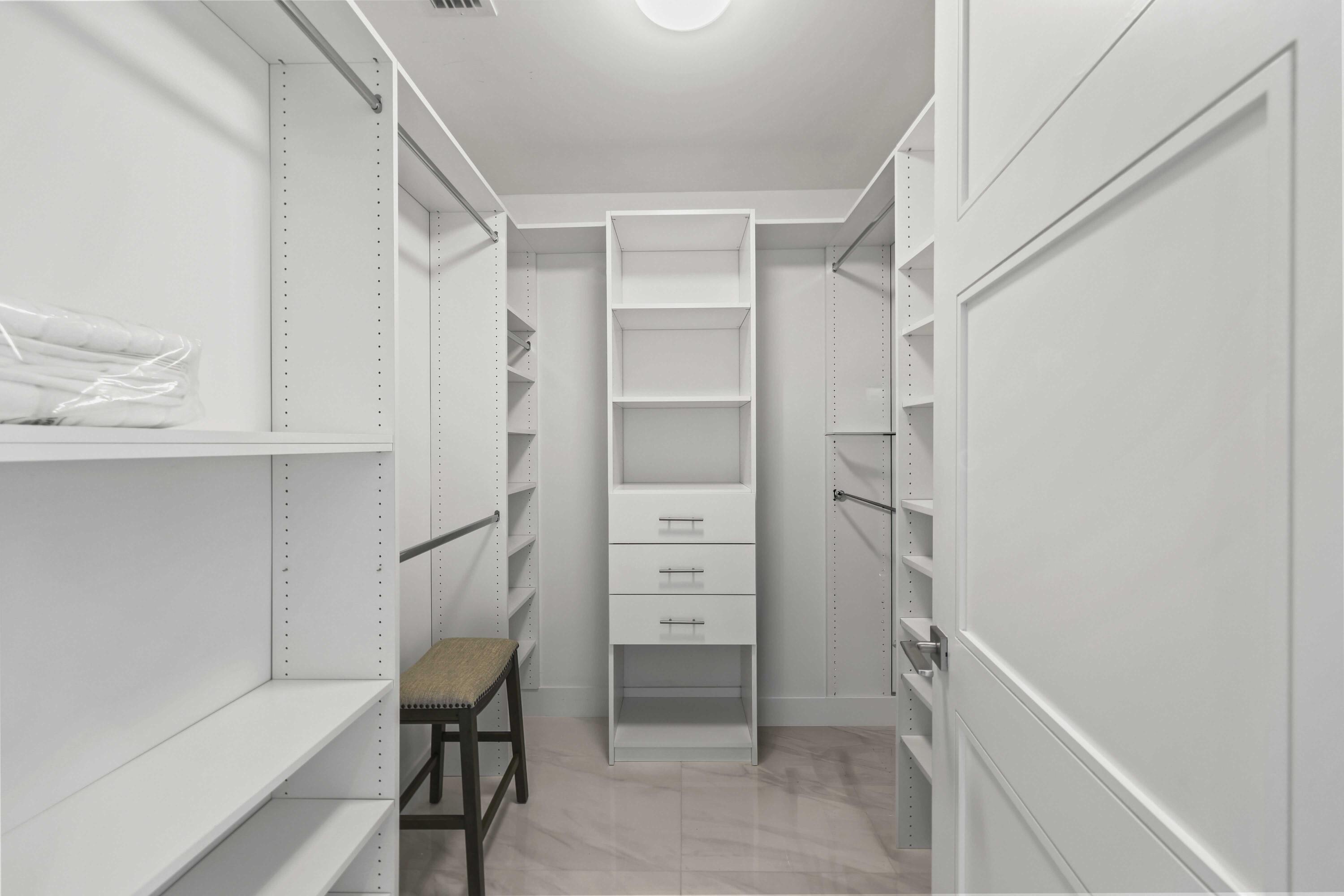 155 East Boca Raton Road, Unit 723 Boca Raton, FL 33432 - Photo 27 of 54 a view of walk in closet with empty racks