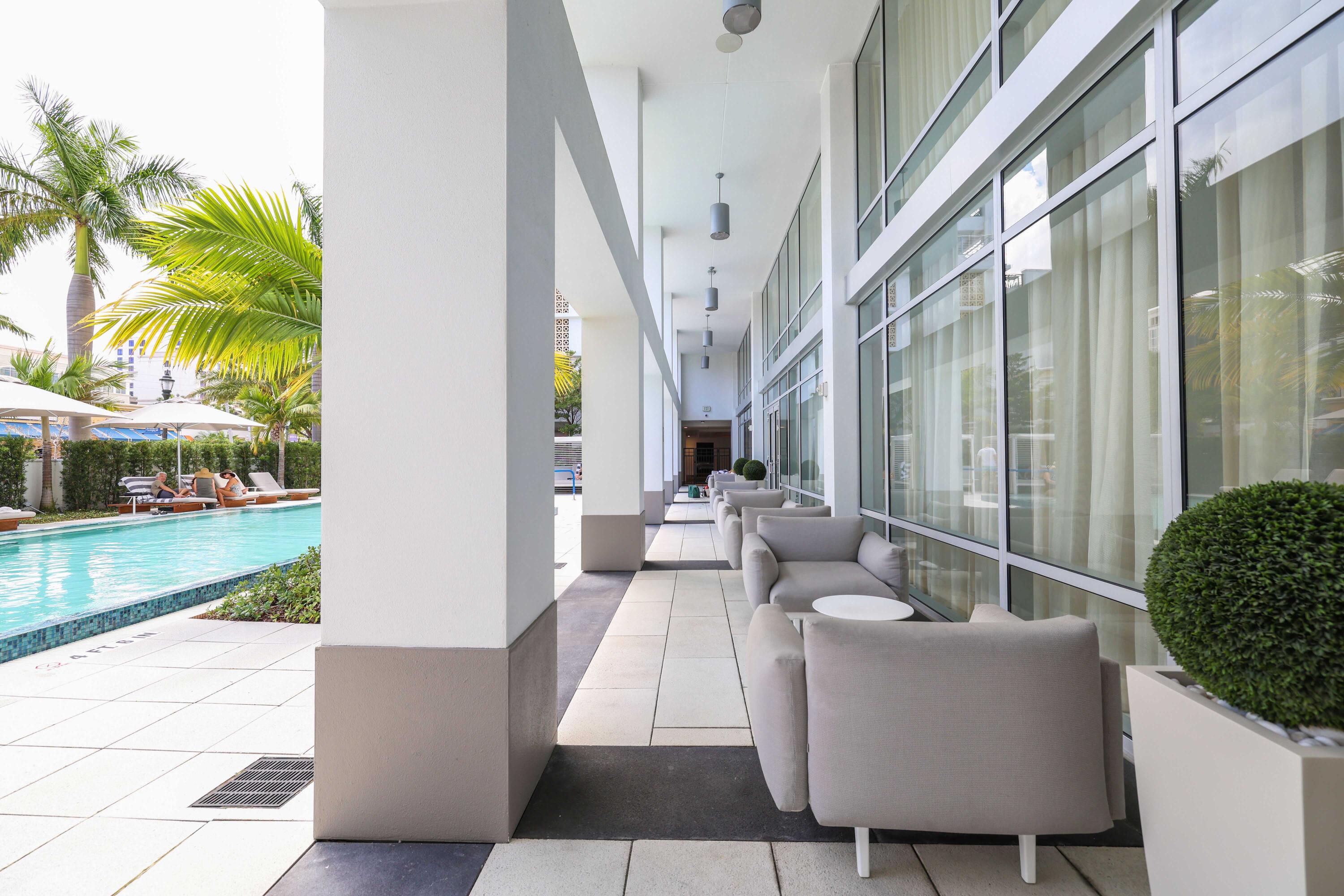 155 East Boca Raton Road, Unit 723 Boca Raton, FL 33432 - Photo 34 of 54 a living room with couches and a coffee table with garden view