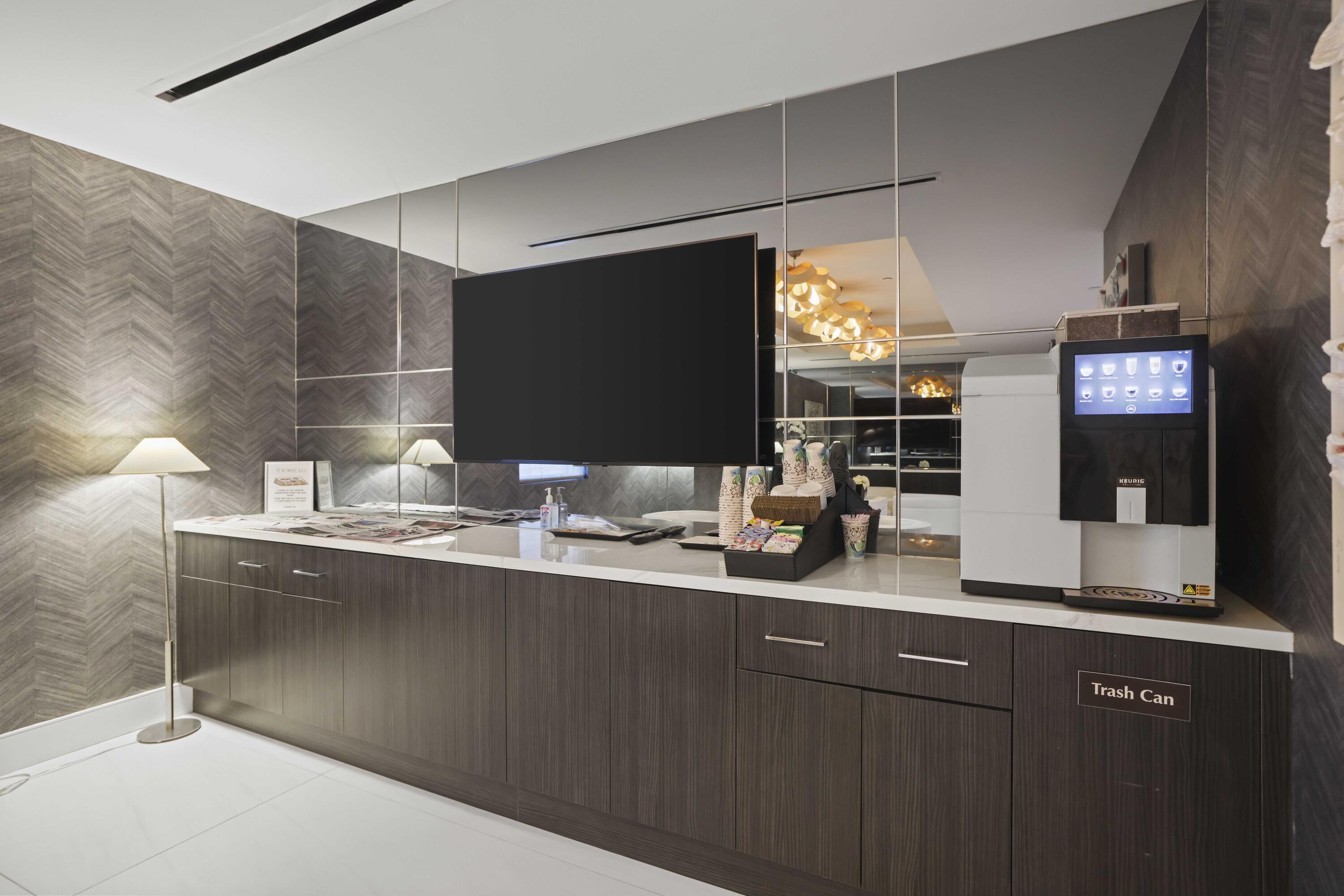 155 East Boca Raton Road, Unit 723 Boca Raton, FL 33432 - Photo 37 of 54 a kitchen with stainless steel appliances a sink and cabinets