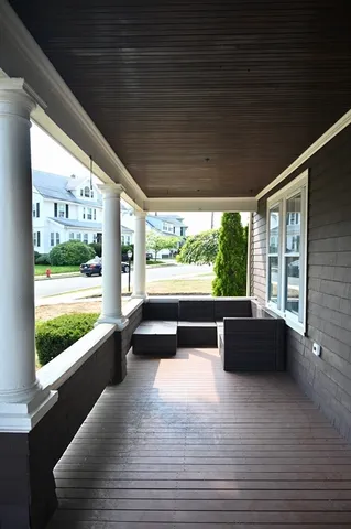 a view of two chairs with wooden floor