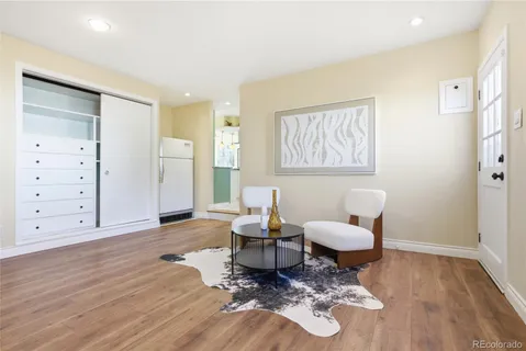 a view of a dining room with furniture and window