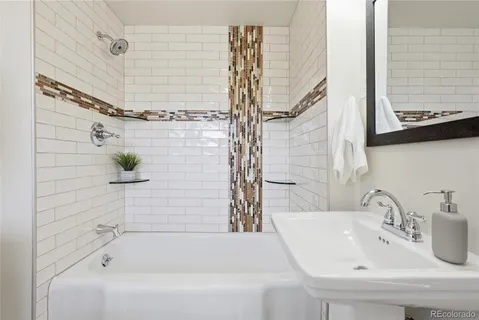 a view of yard with swimming pool and trees