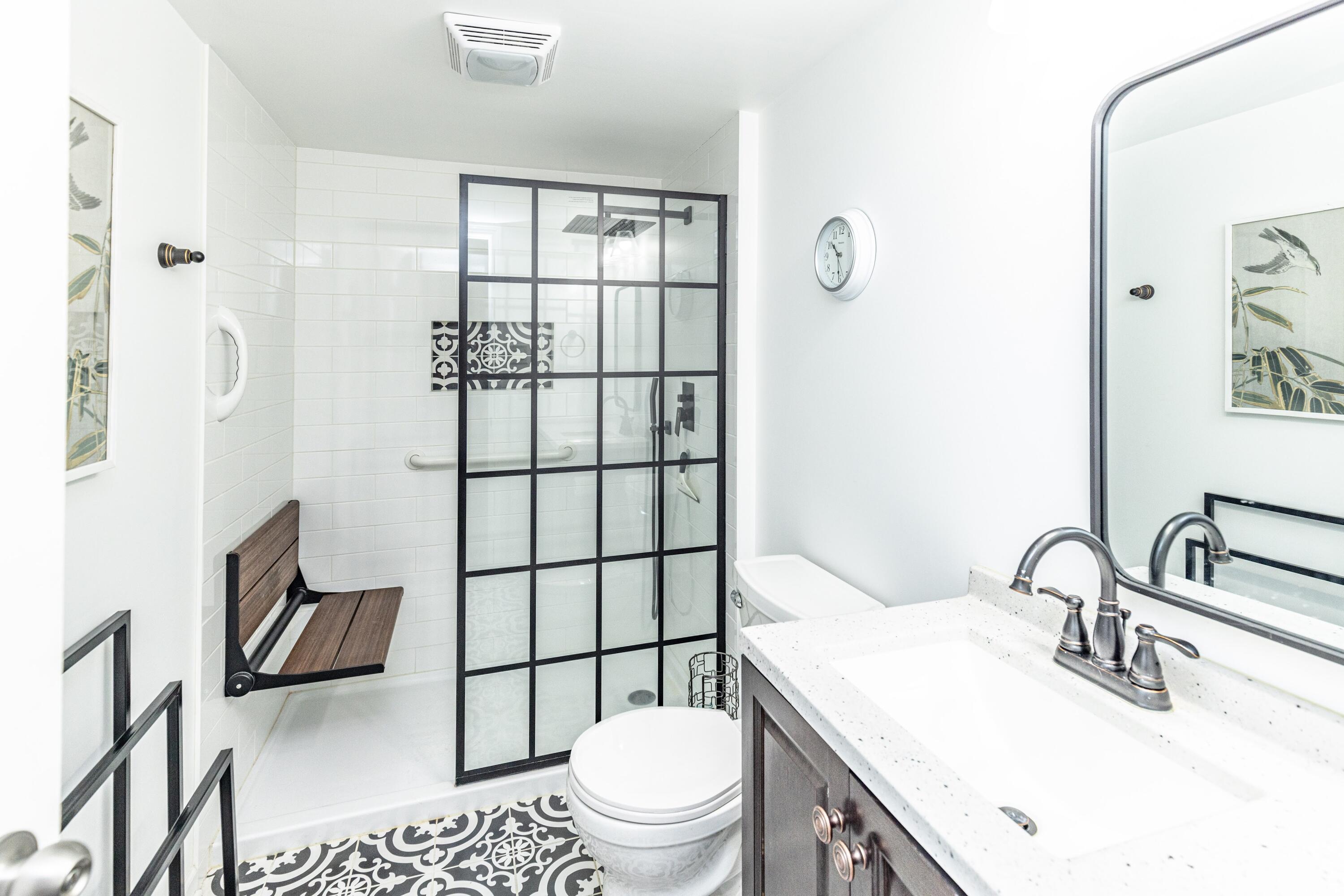 746-1 Acadia Road Valparaiso, IN 46385 - Photo 12 of 44 a bathroom with a sink toilet vanity and shower