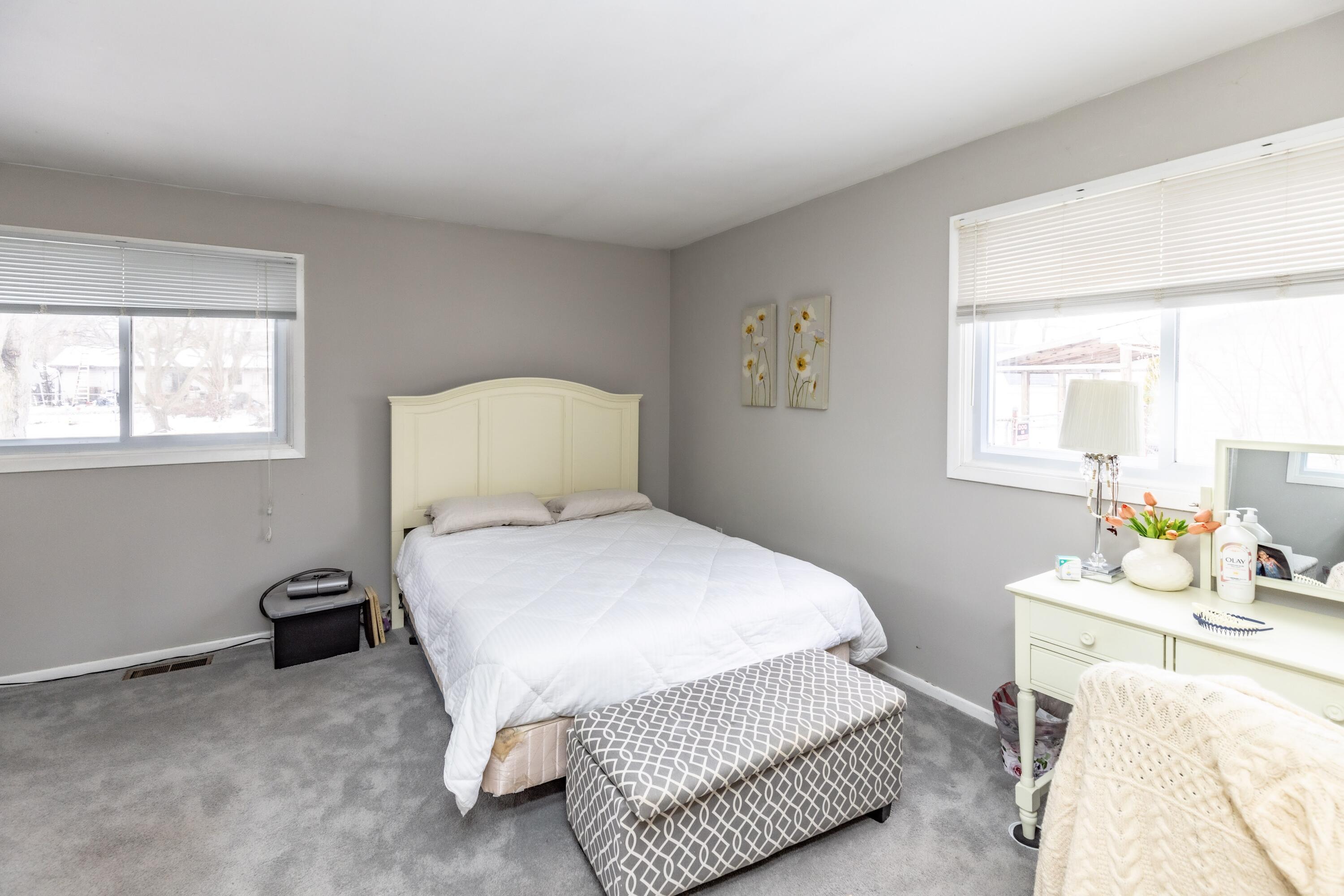 746-1 Acadia Road Valparaiso, IN 46385 - Photo 20 of 44 a bedroom with a bed and window