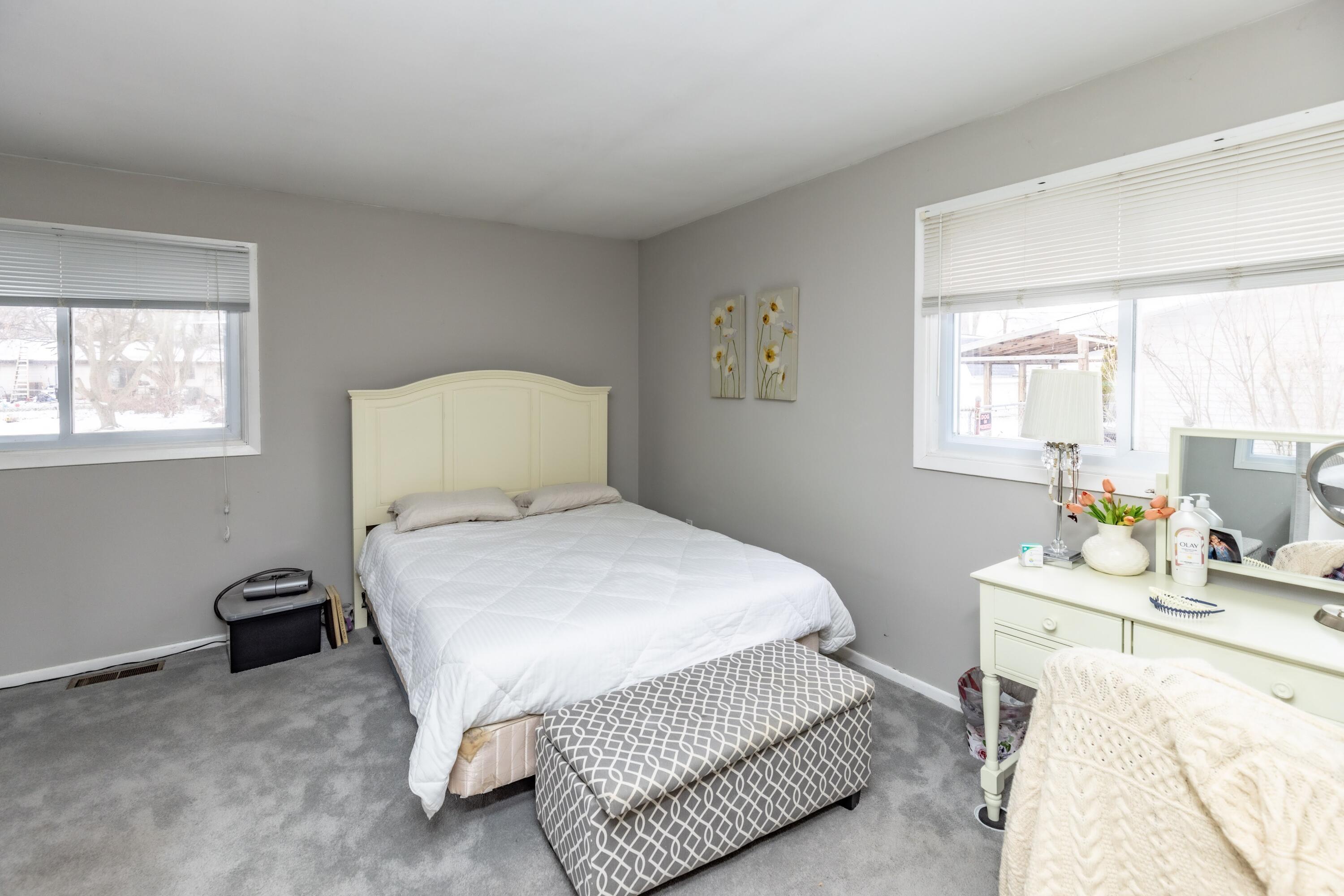 746-1 Acadia Road Valparaiso, IN 46385 - Photo 21 of 44 a bedroom with a bed and window