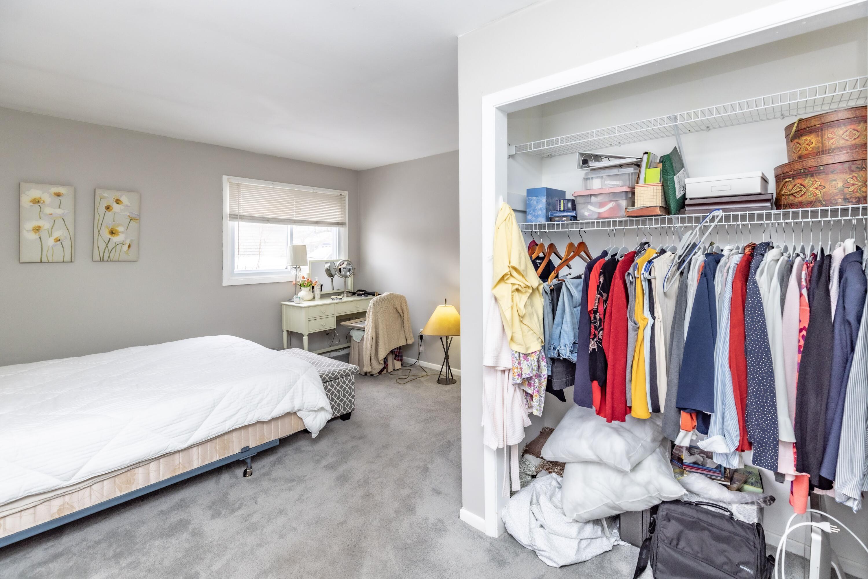 746-1 Acadia Road Valparaiso, IN 46385 - Photo 23 of 44 a bed room with a bed and a view of living room