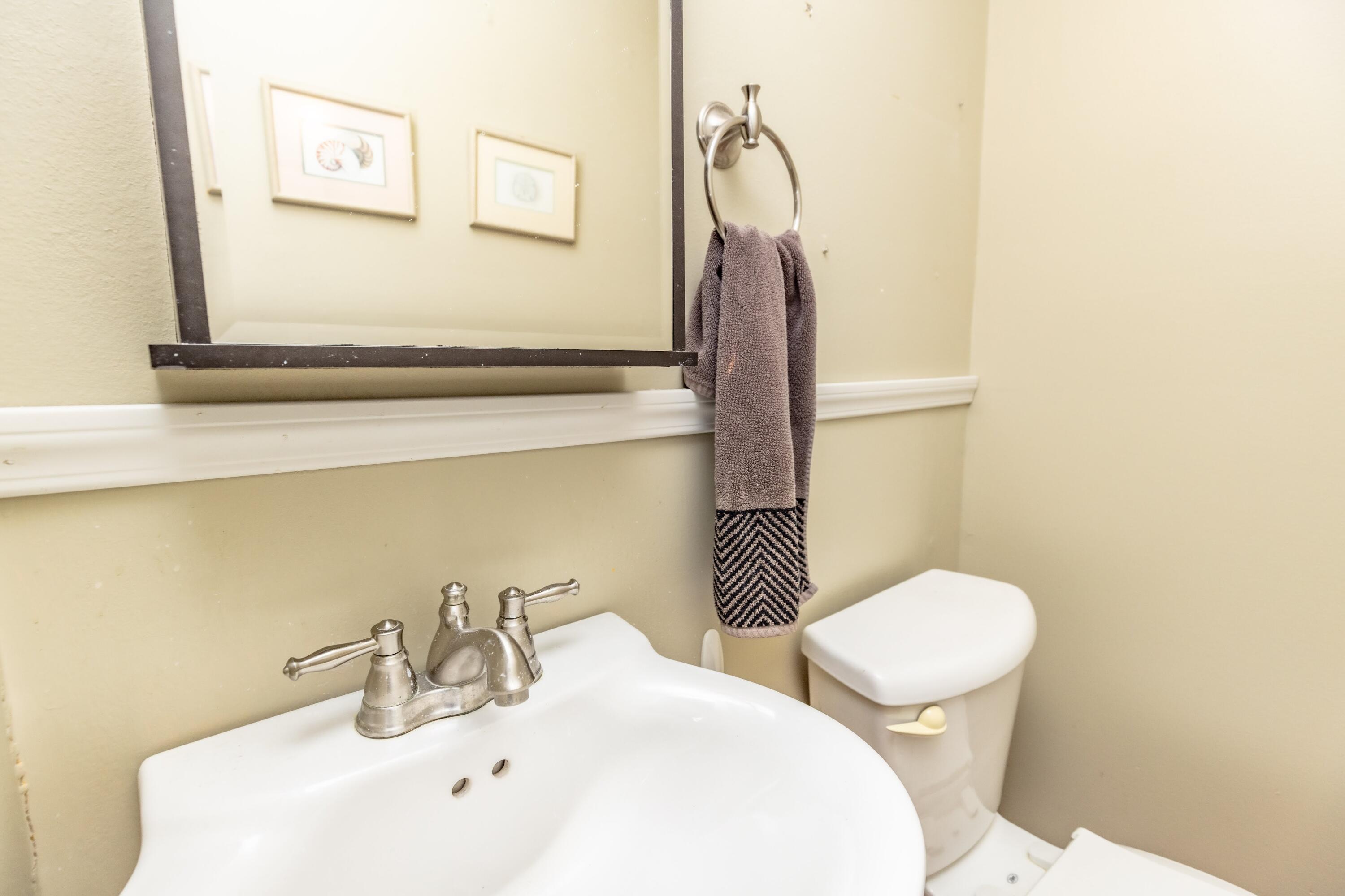 746-1 Acadia Road Valparaiso, IN 46385 - Photo 27 of 44 a bathroom with a toilet sink and mirror