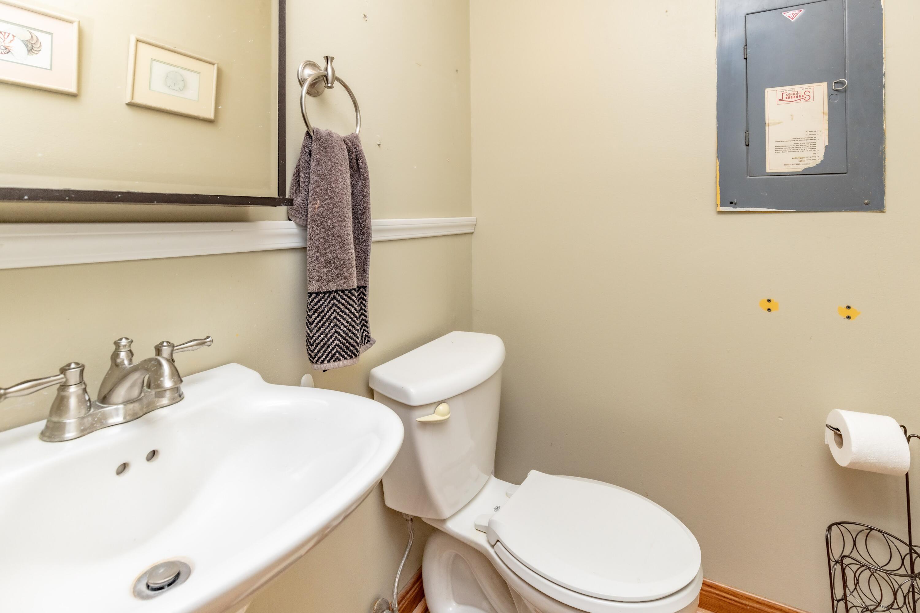 746-1 Acadia Road Valparaiso, IN 46385 - Photo 28 of 44 a white toilet sitting next to a bathroom sink
