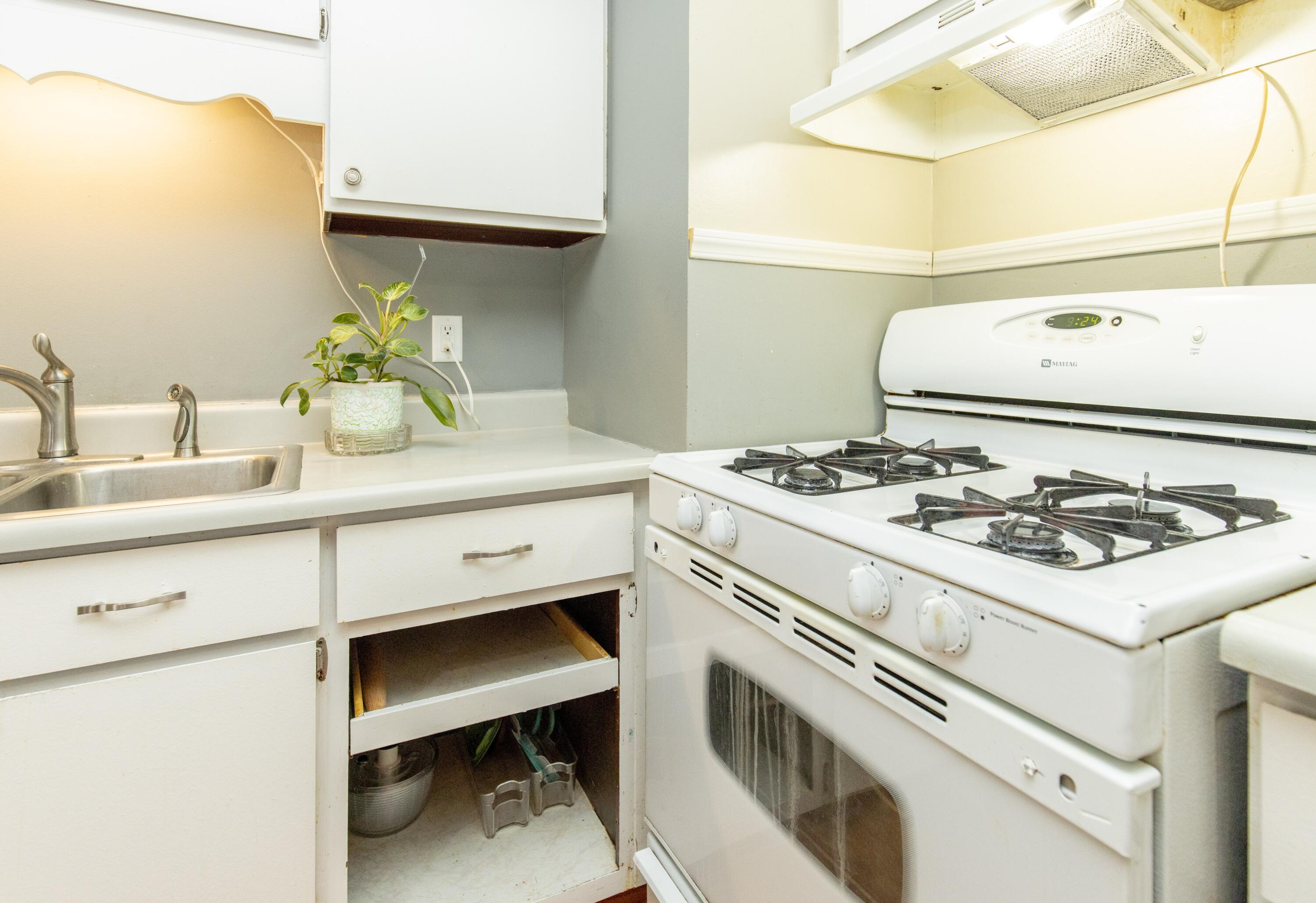 746-1 Acadia Road Valparaiso, IN 46385 - Photo 44 of 44 a kitchen with a stove a sink and a refrigerator