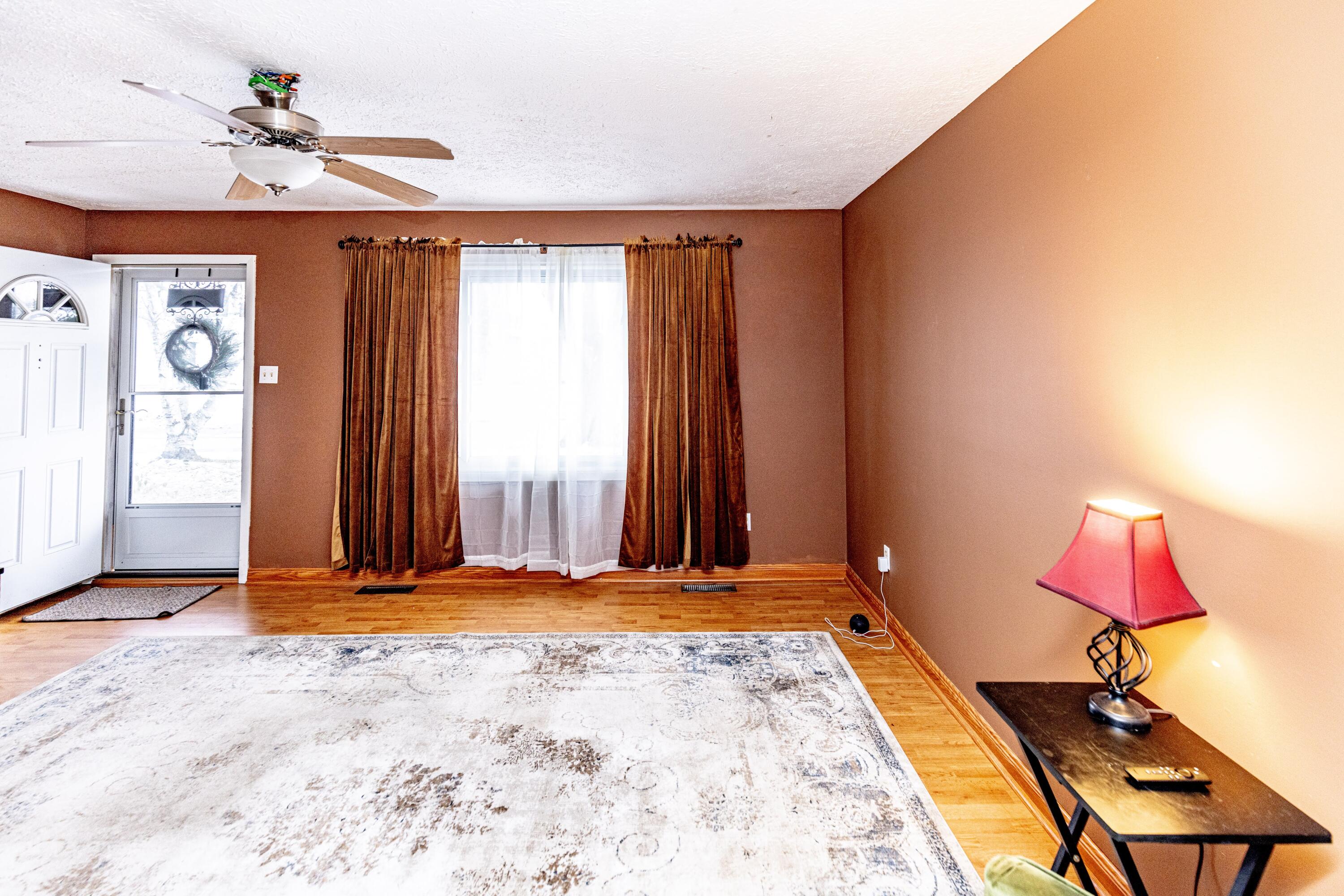 746-1 Acadia Road Valparaiso, IN 46385 - Photo 6 of 44 a view of room with window and a ceiling fan