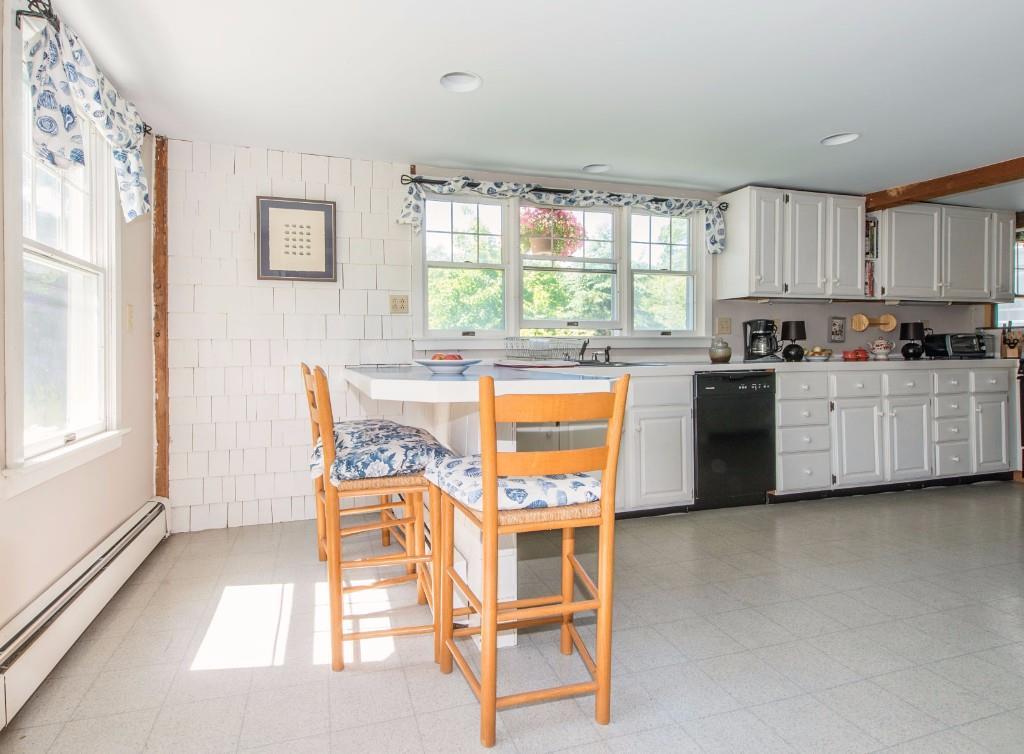 581 Ocean Point Road Boothbay, ME 04544 - Photo 8 of 25 End of kitchen with breakfast counter
