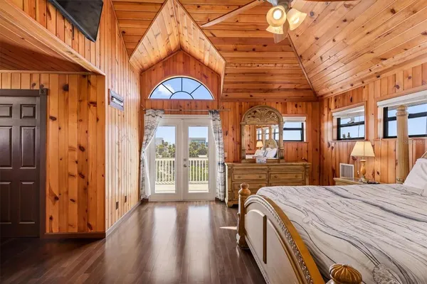 a view of a porch with wooden floor