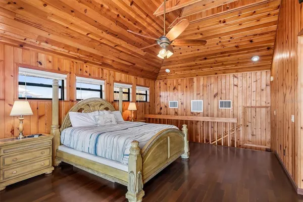 a view of a porch with wooden floor