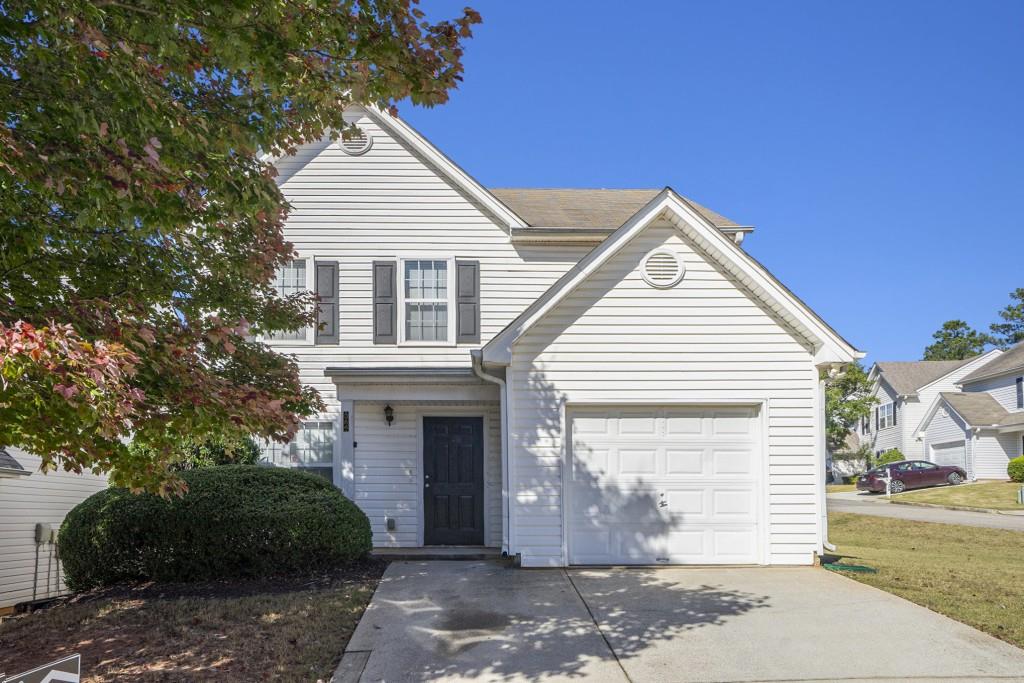 364 Springhaven Way Southeast Lawrenceville, GA 30046 - Photo 1 of 1 a view of a house with a yard