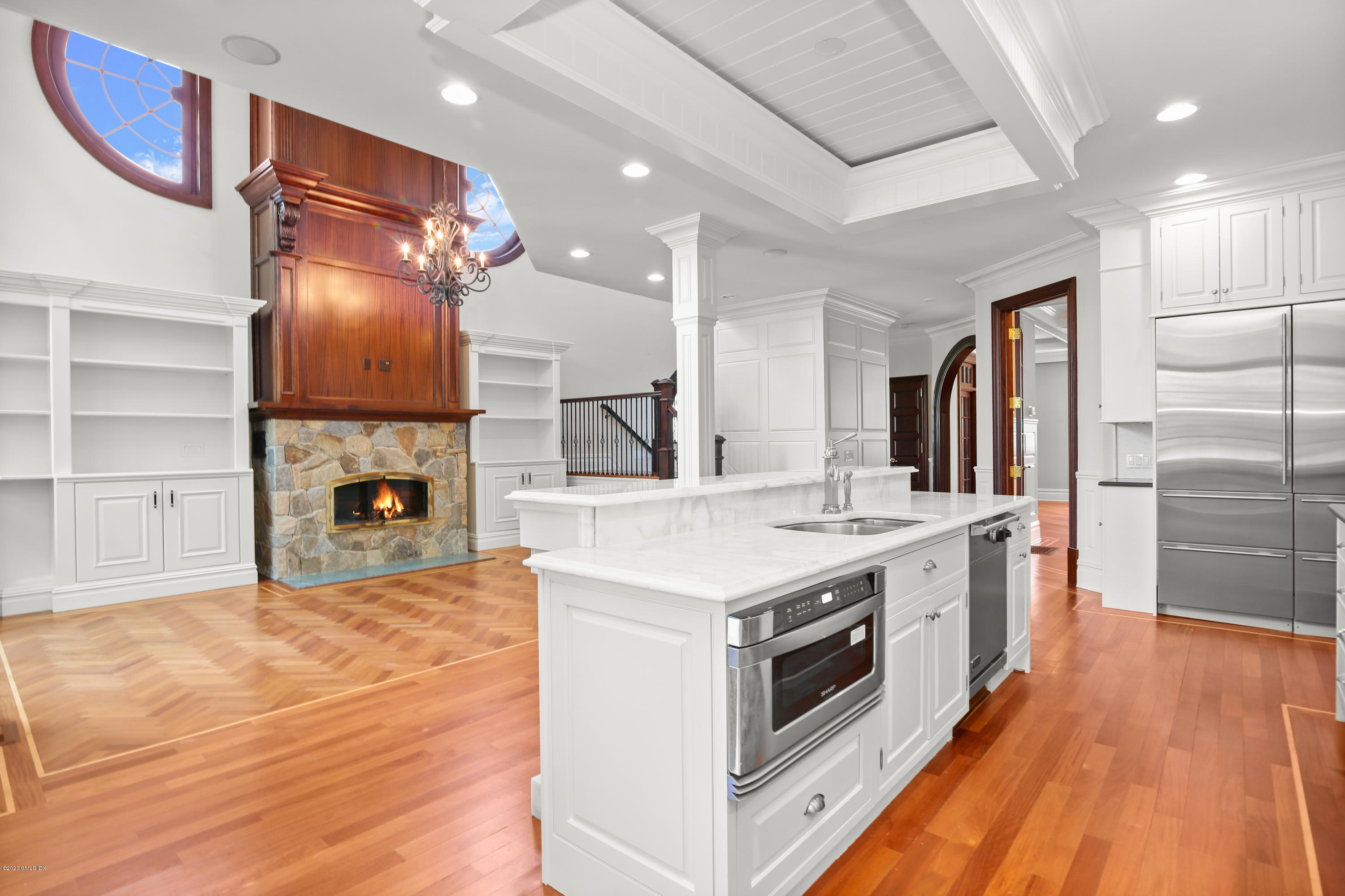 99 Valley Road, Unit E Cos Cob, CT 06807 - Photo 12 of 28 a kitchen with a stove and a refrigerator