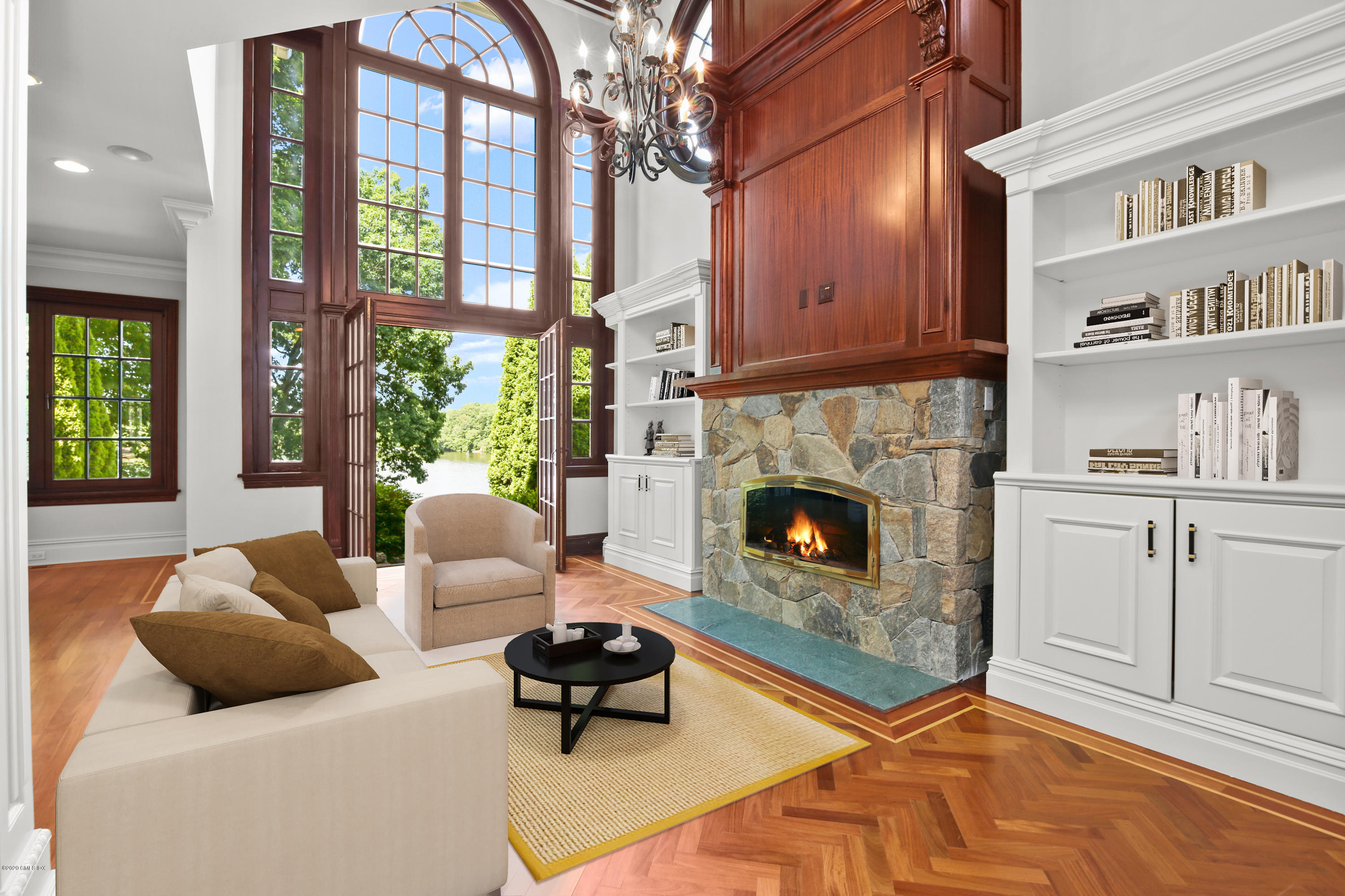 99 Valley Road, Unit E Cos Cob, CT 06807 - Photo 14 of 28 a living room with furniture a fireplace and a window