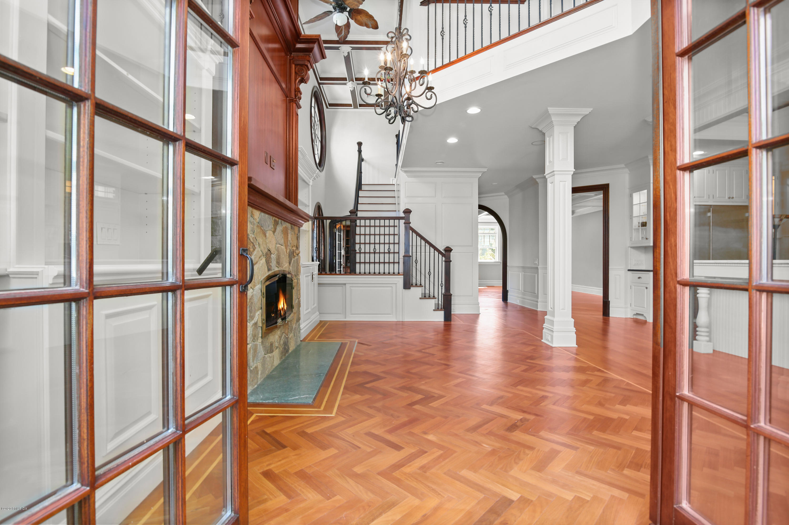99 Valley Road, Unit E Cos Cob, CT 06807 - Photo 15 of 28 a view of an entryway with wooden floor and door