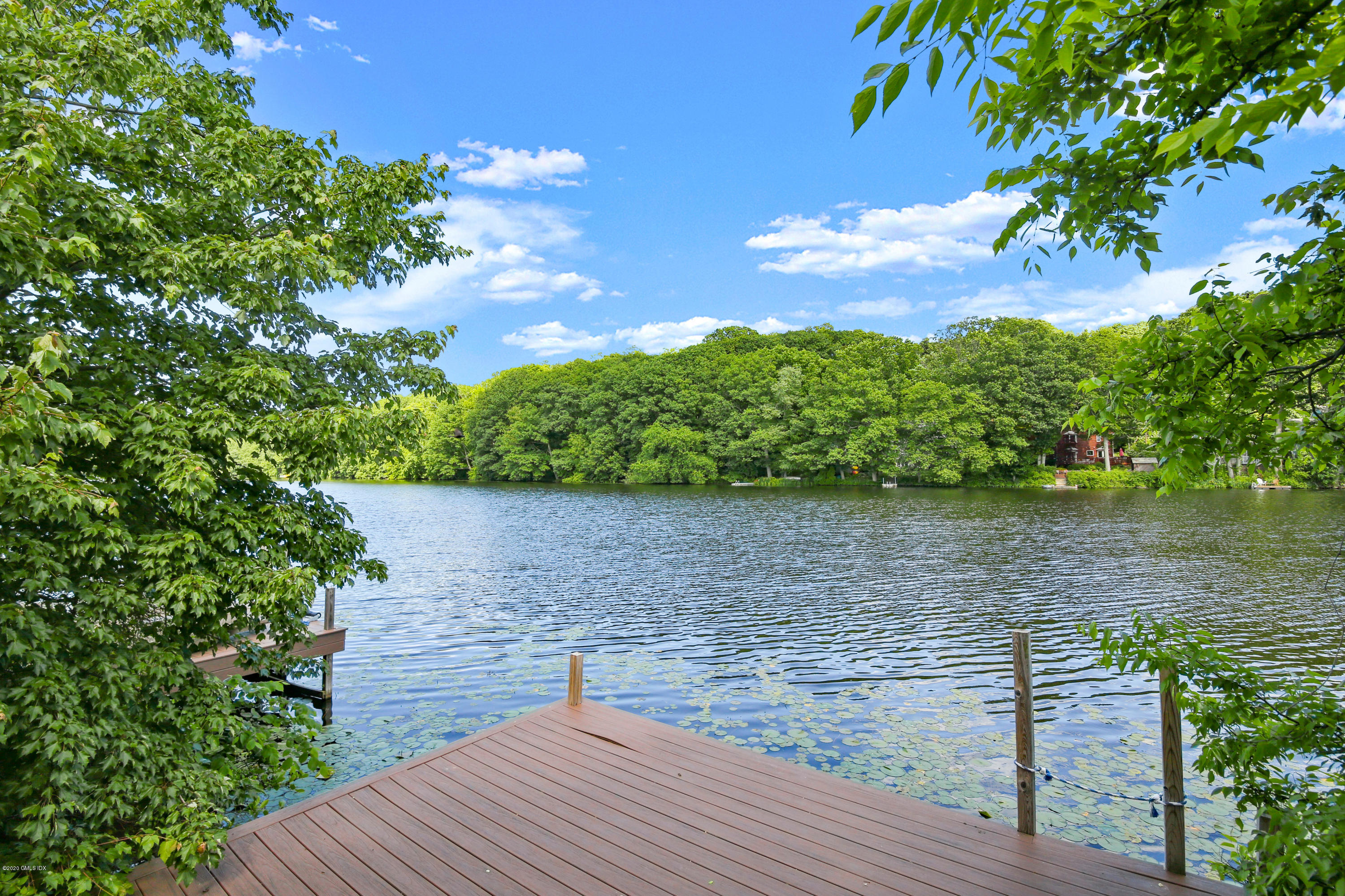 99 Valley Road, Unit E Cos Cob, CT 06807 - Photo 25 of 28 a view of lake from a house