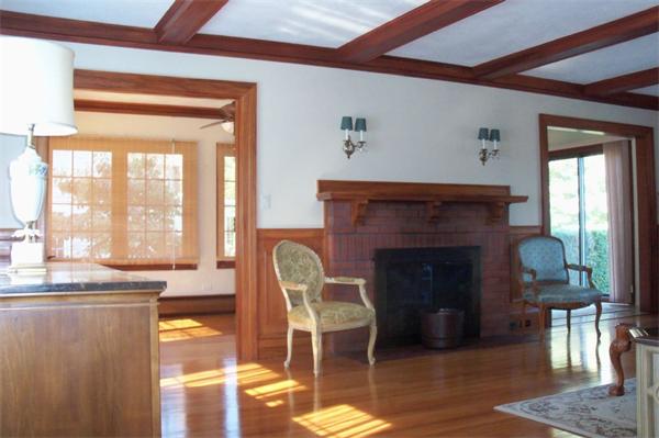 33 Chesterfield Road Newton, MA 02465 - Photo 3 of 10 a living room with furniture and a fireplace
