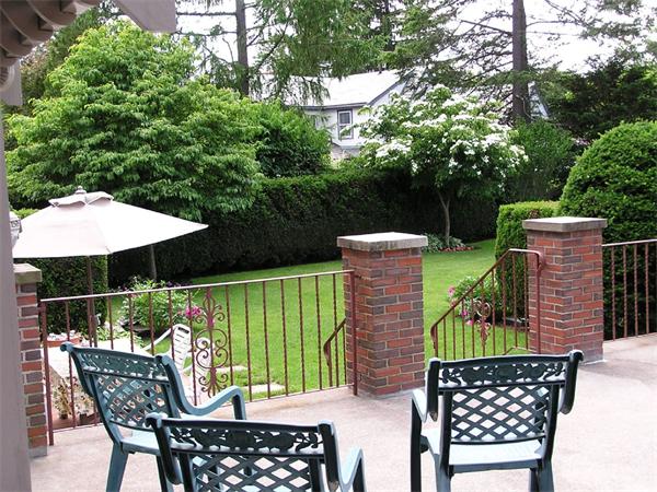 33 Chesterfield Road Newton, MA 02465 - Photo 8 of 10 a patio with table and chairs