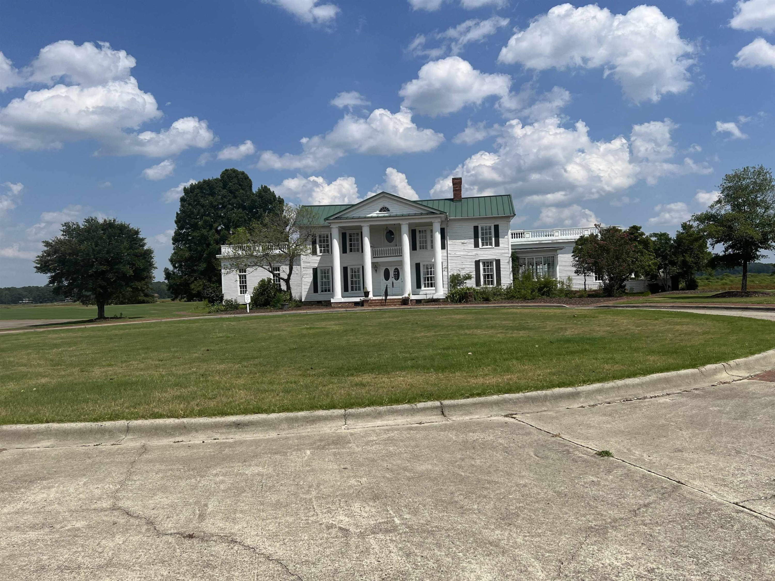 709 Thrush Drive Vass, NC 28394 - Photo 3 of 9 a view of a house with a big yard and a large trees