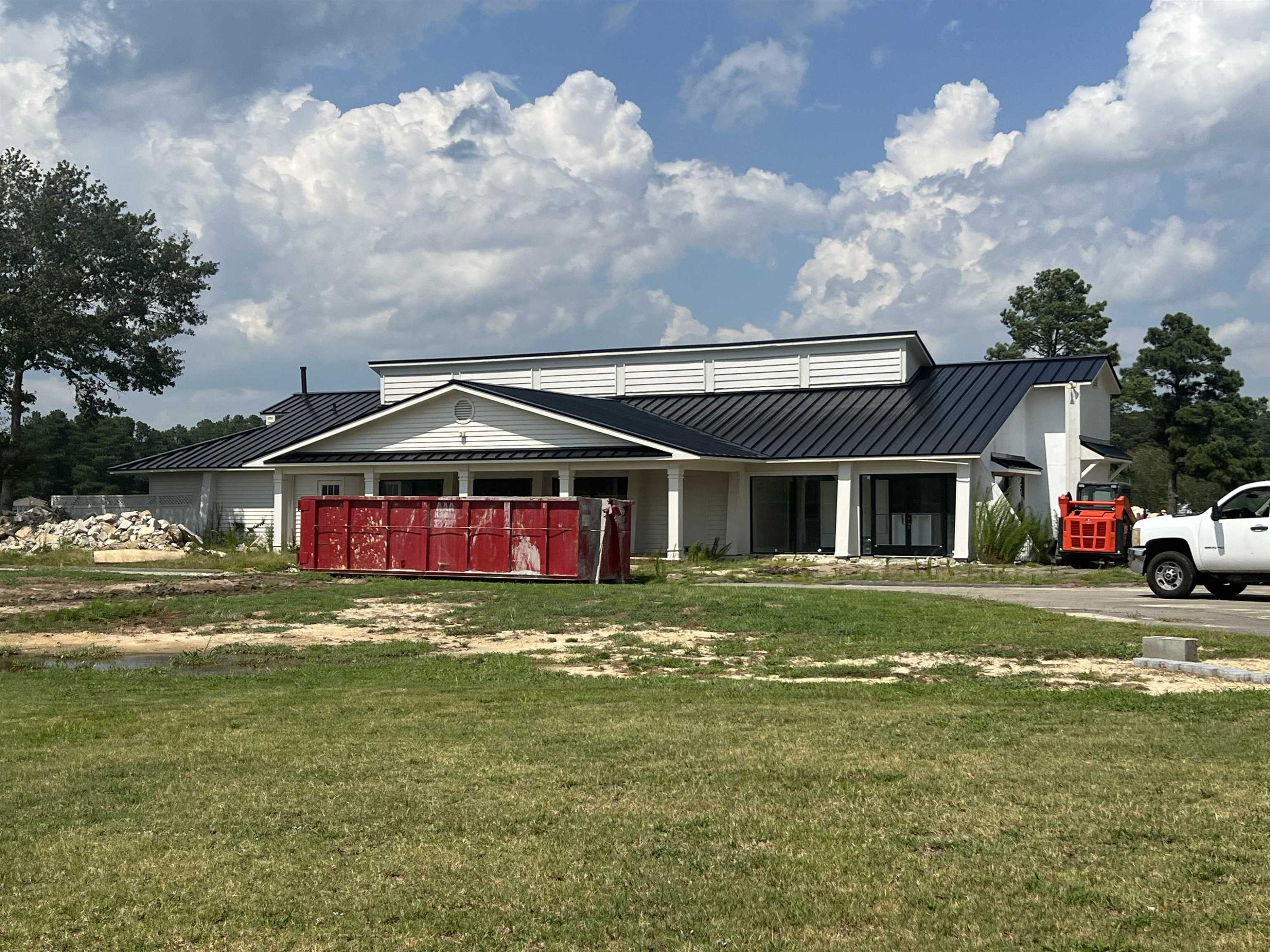 709 Thrush Drive Vass, NC 28394 - Photo 5 of 9 a front view of a house with a garden
