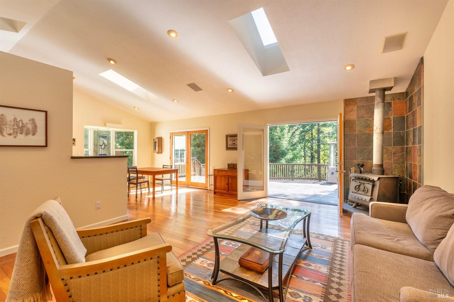 18940 Timber Pointe Drive Fort Bragg, CA 95437 - Photo 11 of 32 Living room with skylights and French doors