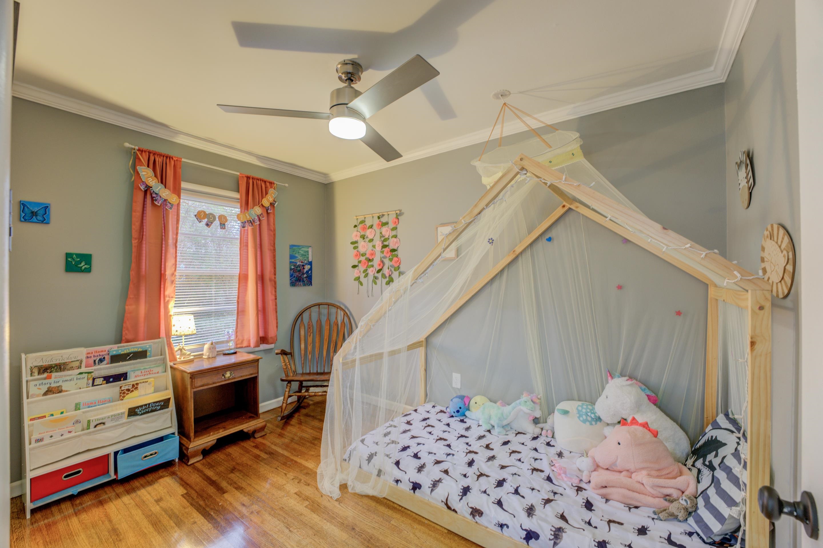 4990 Sea Isle Road Memphis, TN 38117 - Photo 17 of 25 a bedroom with furniture and a window
